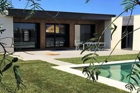 Maison en bardage Equitone blanc et gris